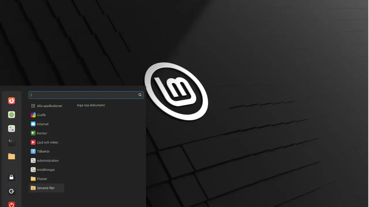 Linux Mint svenska med en meny för applikationer, grafik, internet och mer.