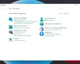 Windows 11 kontrollpanelen visar inställningar för system, nätverk, hårdvara, program, användarkonton, utseende, tid och hjälpmedel.