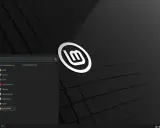Linux Mint svenska med en meny för applikationer, grafik, internet och mer.