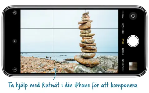 En iPhone-kamera visar en stenhög vid havet. Rutnätet hjälper till att komponera bilden, så att du kan undvika att dina bilder blir lite blurra bilder iphone.