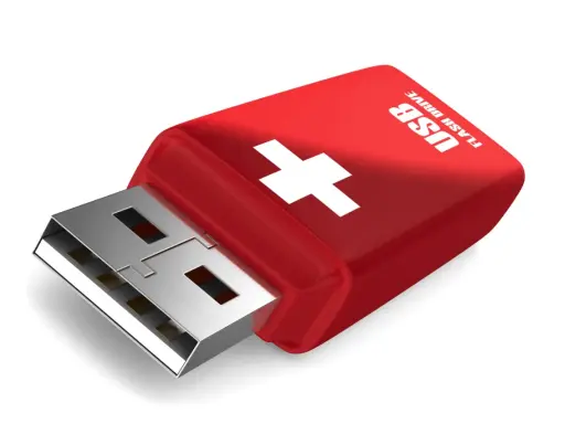Röd USB-sticka med vitt kors, redo att boota från usb.