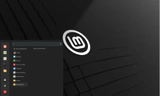 Linux Mint svenska med en meny för applikationer, grafik, internet och mer.