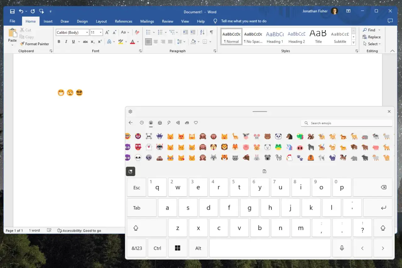 En emoji-tangentbord visas, redo att lägga till ett kortkommando emoji i ditt dokument.
