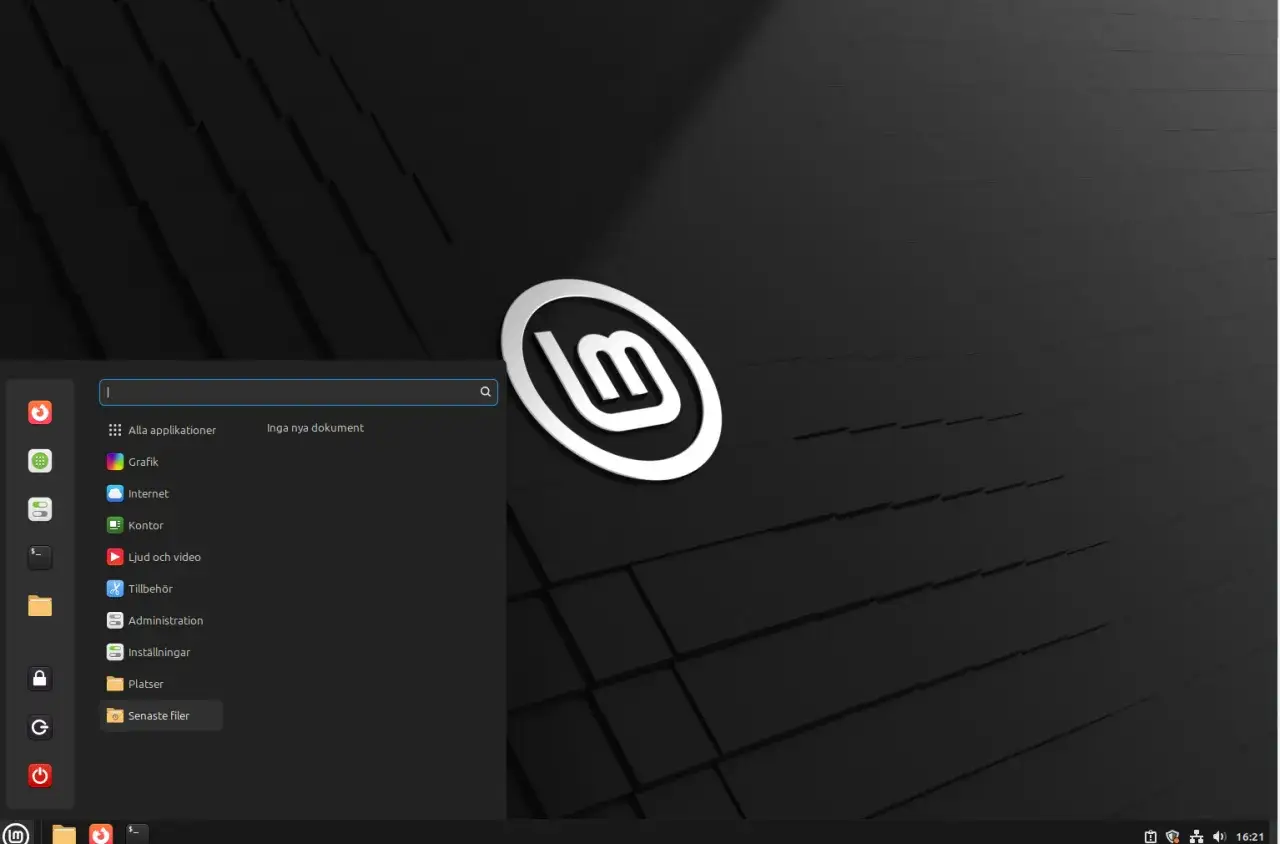 Linux Mint svenska med en meny som visar applikationer som Grafik, Internet och Kontor.